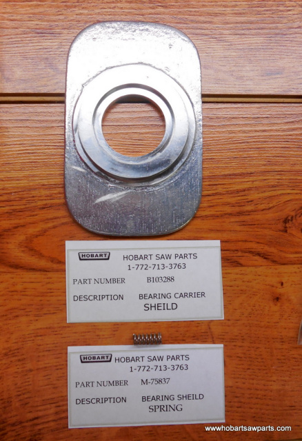 Upper Bearing Carrier Shield & Spring for Hobart 5514 & 5614 Saws.